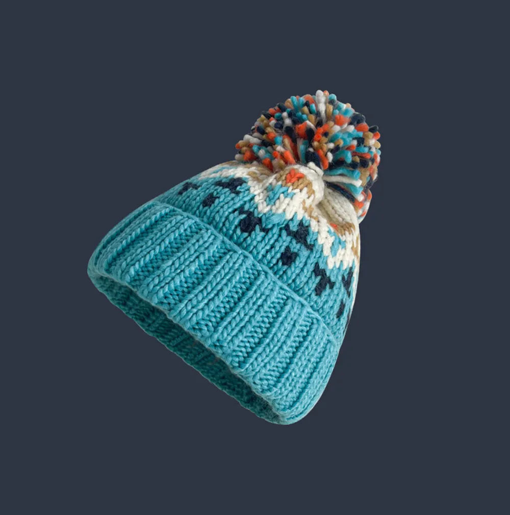 Deborah | Snug Snowflake Pom Beanie