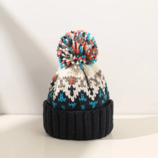 Deborah | Snug Snowflake Pom Beanie